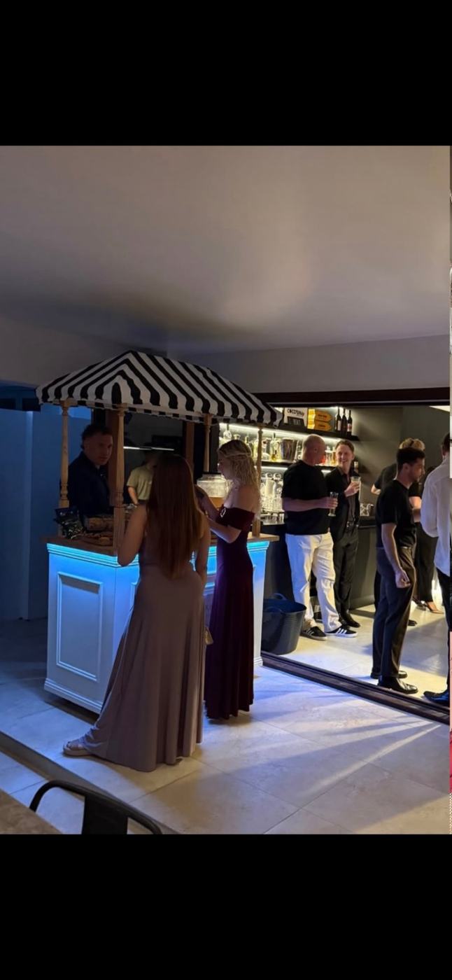 Personalised champagne cart in use with colour-changing LED lighting